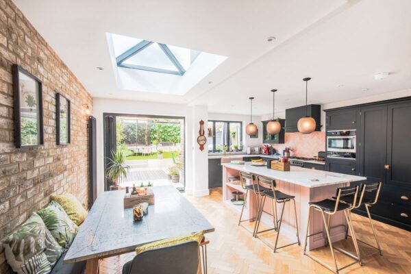 Kitchen extension | Sky light | Kitchen island | Bifold doors | Brick wall interior | simply extend